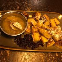 A sophisticated version of bread pudding where by it is cut into pieces and then baked with nuts and currants. at Bodhi in Munich