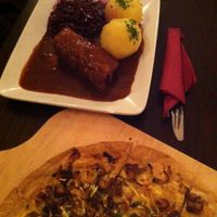 Roulade (background) and smoked tofu pflammkuchen (foreground) at Bodhi in Munich