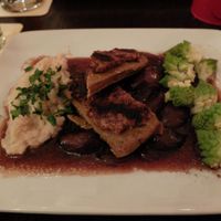 Gebratenes Lupinenfilet mit Senfkruste, dazu Rotweinschalotten,
Romanesco und Pastinakenpüree

(Roasted lupin fillet with mustard crust, red wine shallots,
romanesco and parsnip puree) at Bodhi in Munich