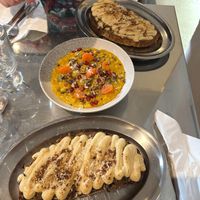 Pulled 'mushrooms' with vegan bechamel sauce & sour cabbage toast on sourdough bread, and daily dish with buckwheat. at 201 STUDIO in Zagreb