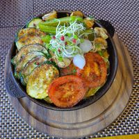 The Rösti is hidden under all the grilled vegetables! at Fein Restaurant in Leukerbad