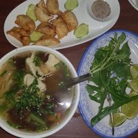 Dumpling noodle soup and fired dumplings! Delicious and vegan. at Maitreya Healthy Vegetarian Restaurant in Phnom Penh