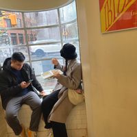 This is all the seating inside (i.e., just about no seating) at Apollo Bagels in New York City