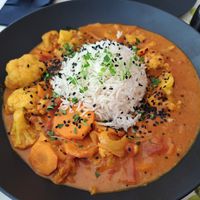 RED CURRY BOWL

Cauliflower and carrot both crispy and creamy perfectly combined with marinated tofu aside at BioMania Bistro in Zagreb