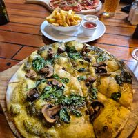 Bannockburn vegan pizza and fries with vegan aoli and tomato sauce at Vogel St Kitchen in Dunedin