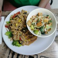 Rasta pasta with Caesar salad at Island Naturals Cafe in Seven Mile Beach