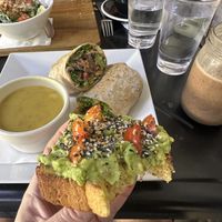 Avo toast, hazelnut smoothie, corn chowder, bbq vegan chorizo sandwich   at Island Naturals Cafe in Seven Mile Beach