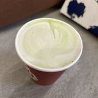 Matcha Hot Chocolate Oat Milk White Chocolate to go 6€  at DRACHE Specialty Coffee Bar in Brussels