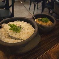 Moqueca de banana rice and citrus farofa at Bananaland in Rio De Janeiro