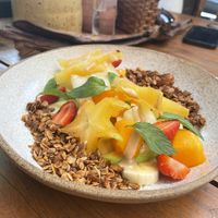 Frutas do dia com granola e tahine ♥️  at Cumbuca in Florianopolis