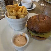 Symplicity plant-based cheeseburger, smokey pickles, signature sauce, fries  at The Havelock Tavern in West London