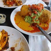 Bottom left: vegan handlebar muffin (half) which comes with potatoes. Top right: vegan chimichanga. at Handlebar in Chicago