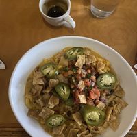 pickled jalapeños, tortilla chips, queso, macaroni, salsa, and vegan chili   at Handlebar in Chicago