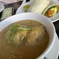 Sausage gravy and biscuits and Breakfast burrito (both vegan)  at Handlebar in Chicago
