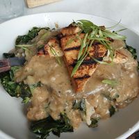 Chicken fried mushroom with grilled tofu with gravy and spinach at Handlebar in Chicago