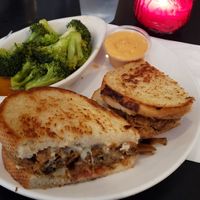 Fried ‘Chicken’ Patty Melt* 
fried mushroom chicken, caramelized onions, tomato and provolone on sourdough, with chipotle aioli dipping sauce at Handlebar in Chicago