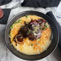 Vegan oxtails and grits  at Bar Vegan Baltimore in Baltimore