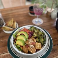 Miso Peanut & Tempeh Bowl, with garlic sourdough bread and kombucha  at Ojas Vegan & Vegetarian Eatery in Siem Reap