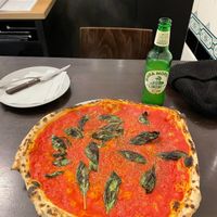 Sometimes, the chef will add lots of basil to your Marinara pizza at Brechts Pizza & Vino in Hannover
