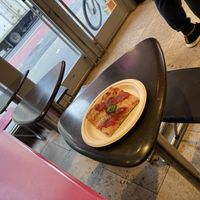 Tables, with my vegan slice  at Unregular Pizza - Upper East Side in New York City