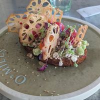Avocado and tofu toast on black garlic bread at PVG - O'Mills Bakery & Bistro T2 - D73 in Shanghai