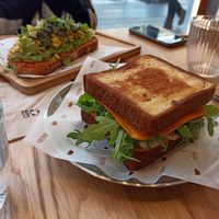 Torrada d'alvocat amb tofu scramble, i bikini de croissant. at Magma Bakery Lab  in Barcelona