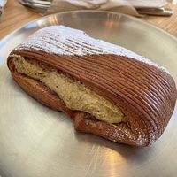 Pastel suizo relleno de crema de chocolate y pistacho  at Magma Bakery Lab  in Barcelona