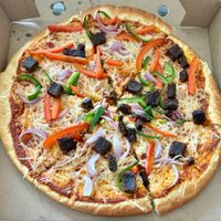 Tandoori pizza at Vegan Burger - Al Ghurair Centre in Dubai