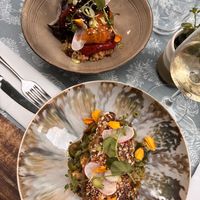 Mains: peppers with fregola sarda, breaded eggplant with fava beans- delicious!  at Thym Et Romarin in Montpellier