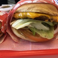 red & yellow burger on the right, Fancy on left   at FACE PLANT in Portland