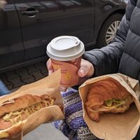 vegan hotdog croissant + vegan croissant with cheese, ham and lettuce + vegan hot choc at La Croissanteria in Plzen