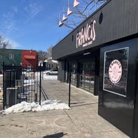 Exterior March 2025. Walls open to an outdoor seasonal patio. at Francis Burger Joint  in Minneapolis
