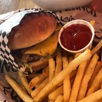 Garlic Girl burger: brioche bun, house black bean cheeseburger, house bacon, berbere aioli, lettuce, and pickled onion 💚  at Francis Burger Joint  in Minneapolis