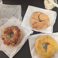 Teriyaki, chocolate, and pumpkin with a side of tofu cream cheese (total $16 CAD) at WA - Bagel in Vancouver