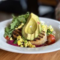 Scrambled tofu, avocado with beetroot hummus on grilled sourdough   at Cafe Medici in Martinborough