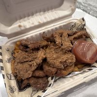 Mushroom chicken with waffle fries   at Breath'g Vegan Food Truck in Merrillville