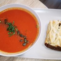 Red Pepper, Carrot and Tomato Soup served with a savoury pastry at Harvest Moon Suffolk in Ipswich