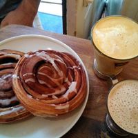 Amazing vegan cinnamon rolls, a Curcuma Latte and a Vanilla oat milk capuccino!! at Sattva Naturbageriet in Stockholm