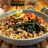 GRAVITY BOWL (df/vegan)
sweet potato hash, sauteed peppers and onion, braised kale, smoked red pepper tahini, avocado, toasted pepita  at Cabin Juice in Breckenridge