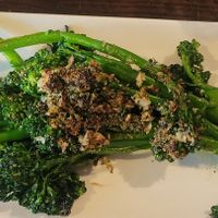 Wood fired broccolini without parm and prosciutto. This looks much smaller than it was. The stems were 8+ inches long. Loved the char from the wood fire! at Bavaro's Pizza in St Petersburg