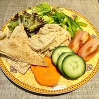 Hummus, salad and Arabic bread  at Al Nafoora in Dubai