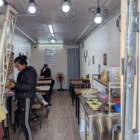 Inside the small restaurant at Chay An Nhiên Vegan Food in Hanoi