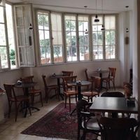 inside and outside seating at Bookworm - Mazeh in Tel Aviv