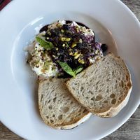 Vegan burrata with blueberry compote, pistachios and sourdoughh  at Sora Diana in Edinburgh