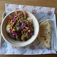 Vegan naughty Greek bowl with pita  at Spicy Feta in St Paul