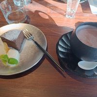 Chocolate cake and amazake (fermented rice drink) at Hitotomori Nara in Nara