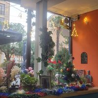 Warm, cute ambience, with a nice garden seating area at Fleur  in Kutaisi