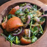 Tomato salad with a flavour-packed ajika sauce. at Doli - Kutaisi in Kutaisi