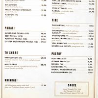 English menu with marked vegetarian and vegan options. at Doli - Kutaisi in Kutaisi