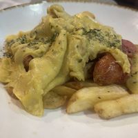 Huevos rotos con butifarraa  at Bar La Plazuela in Gran Canaria